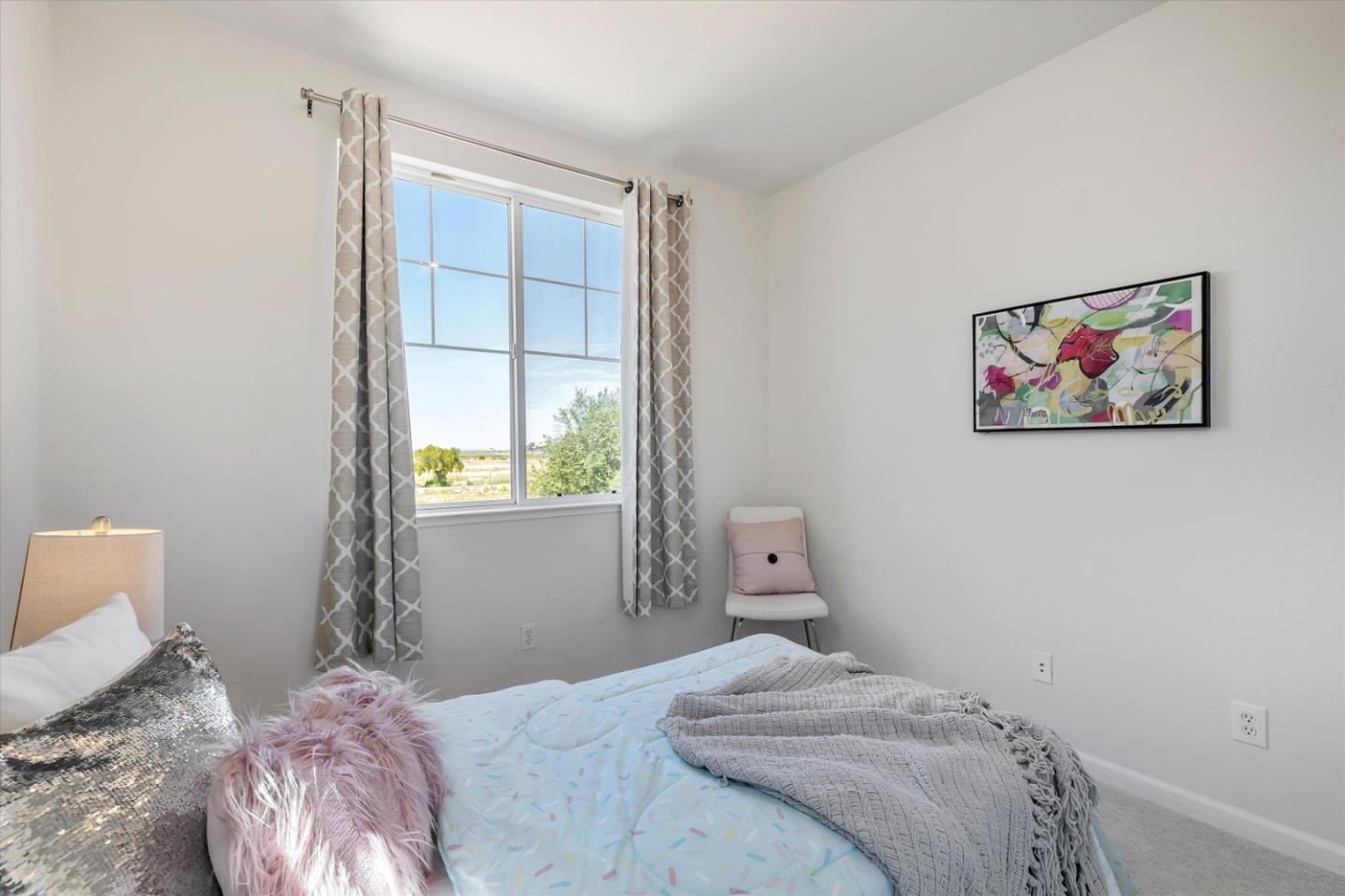 252 Comeabout Circle Pittsburg, CA 94565 - Photo 24 of 41 a bedroom with a bed and a window