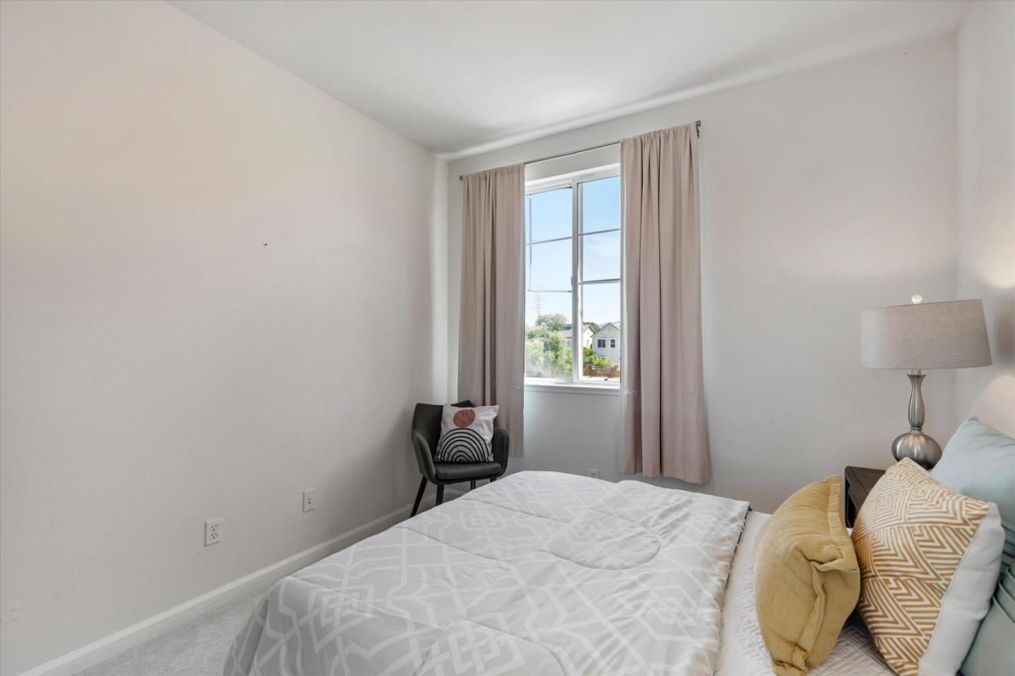 252 Comeabout Circle Pittsburg, CA 94565 - Photo 26 of 41 a bedroom with a bed and a window