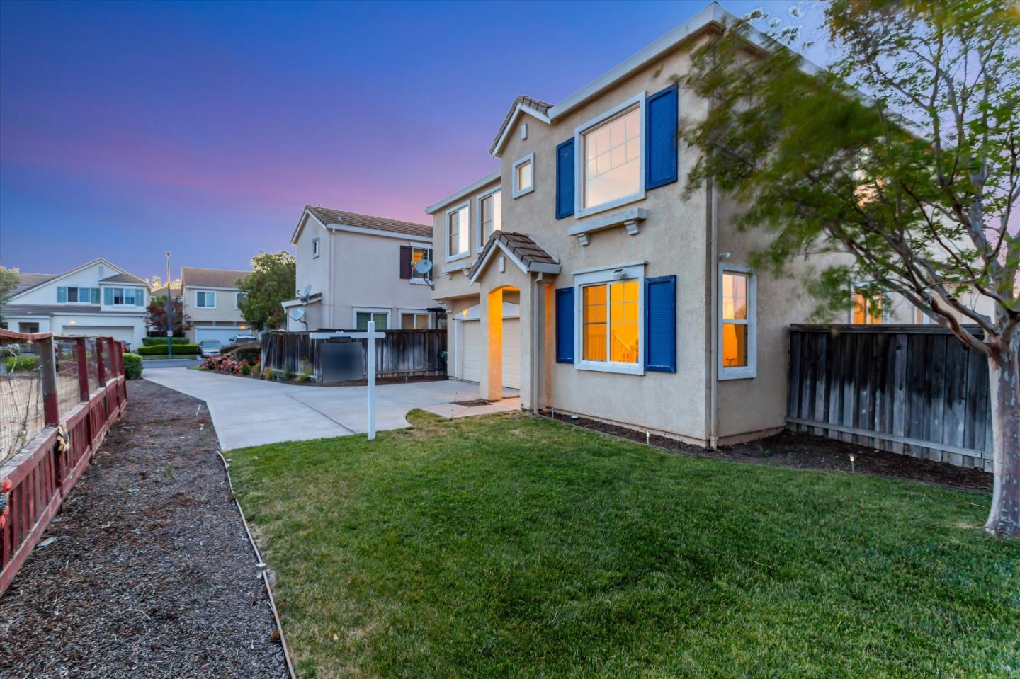 252 Comeabout Circle Pittsburg, CA 94565 - Photo 29 of 41 a front view of a house with garden and sitting area