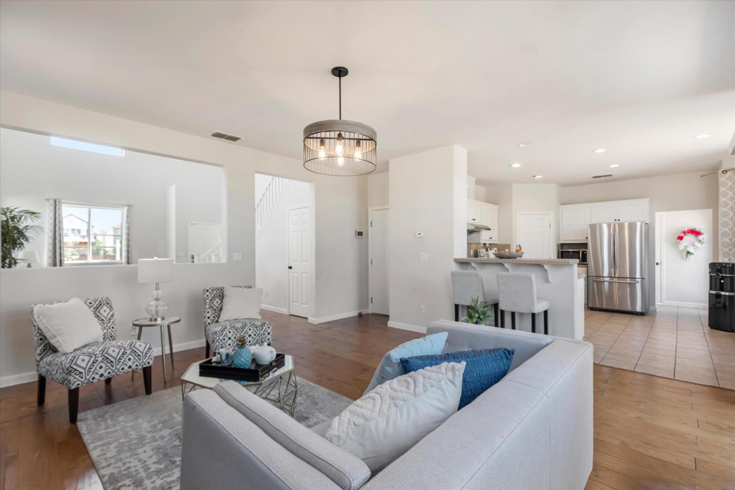 252 Comeabout Circle Pittsburg, CA 94565 - Photo 8 of 41 a living room with furniture and kitchen view