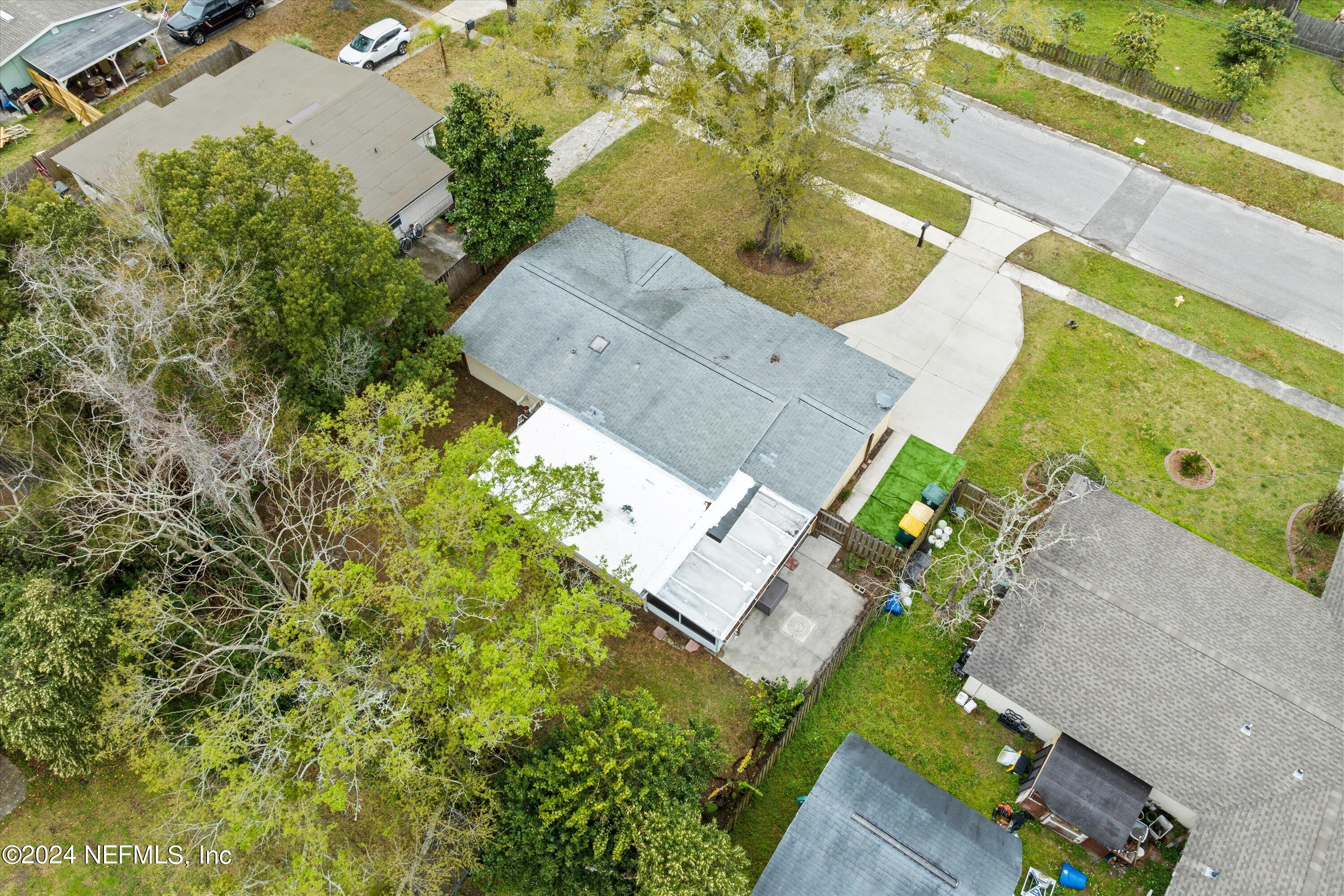 10750 Java Drive Jacksonville, FL 32246 - Photo 23 of 23 an aerial view of a house with a yard