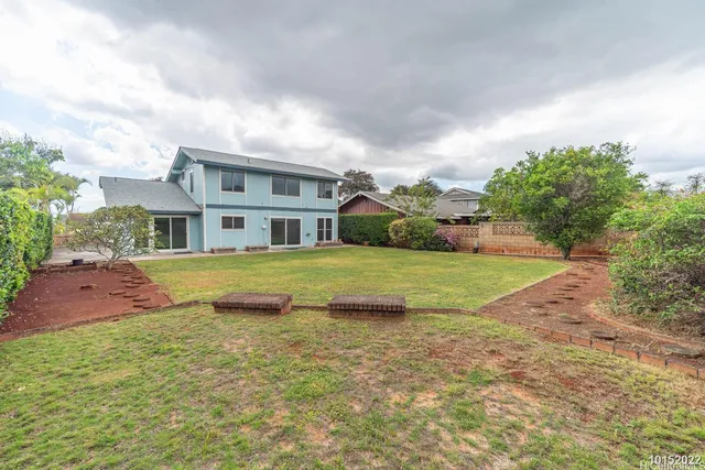 a view of a house with a big yard