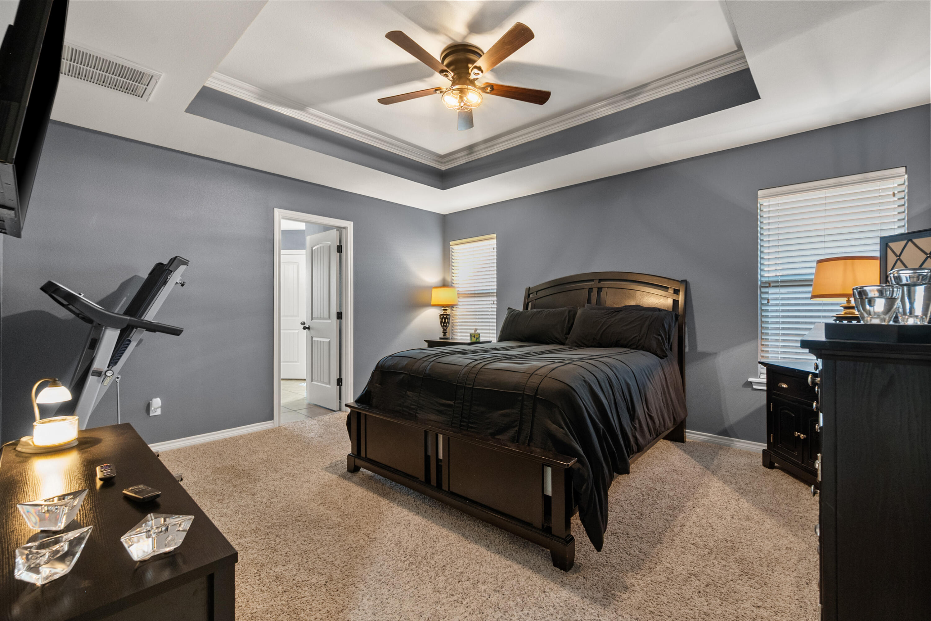 5908 104th Street Lubbock, TX 79424 - Photo 17 of 33 a bedroom with a bed and window