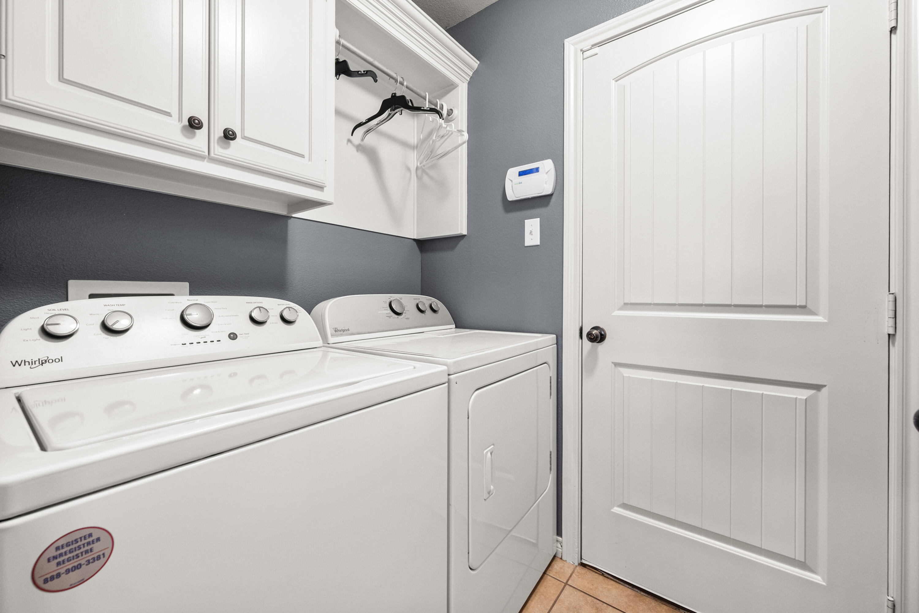 5908 104th Street Lubbock, TX 79424 - Photo 28 of 33 a utility room with dryer and washer