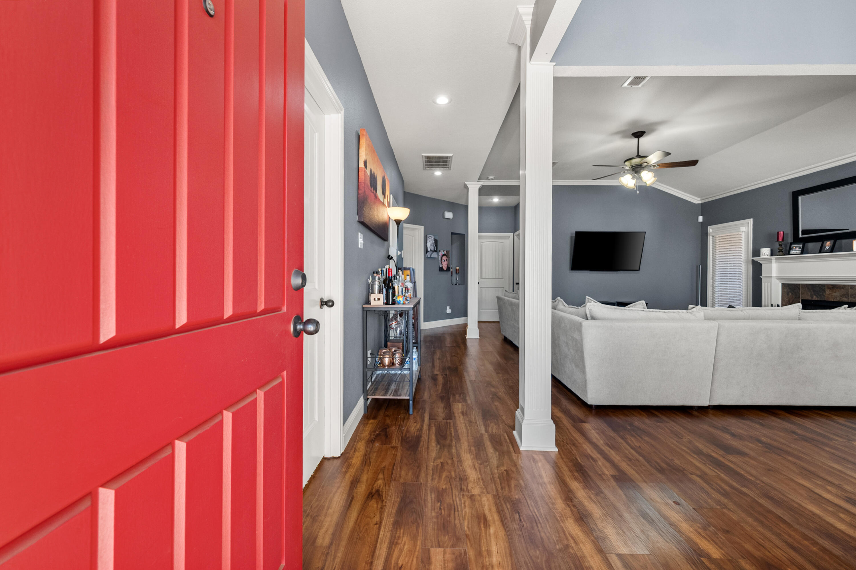 5908 104th Street Lubbock, TX 79424 - Photo 3 of 33 a living room with furniture and a flat screen tv