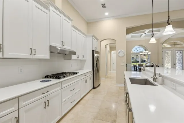 a view of a dining room with furniture and window