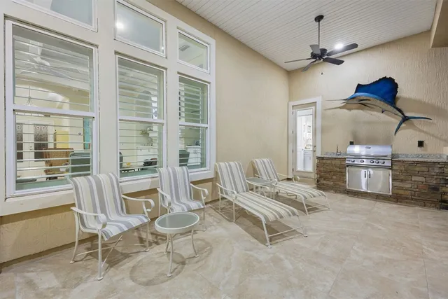 an aerial view of a houses with a yard