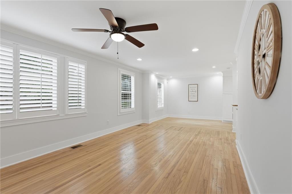 1222 Elizabeth Avenue Southwest Atlanta, GA 30310 - Photo 11 of 46 a view of a room with wooden floor and windows