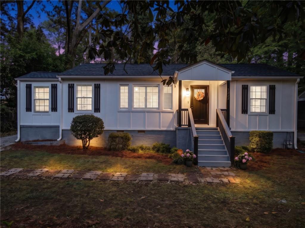 1222 Elizabeth Avenue Southwest Atlanta, GA 30310 - Photo 2 of 46 a front view of a house with garden