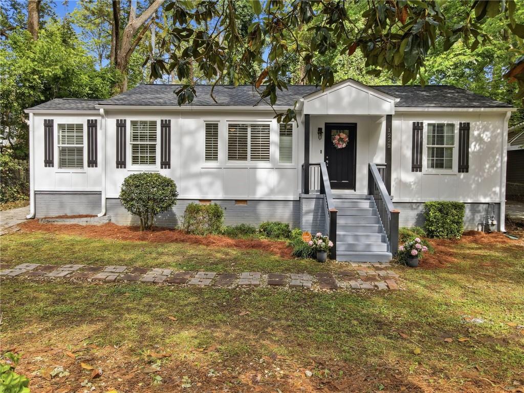 1222 Elizabeth Avenue Southwest Atlanta, GA 30310 - Photo 3 of 46 a front view of a house with yard