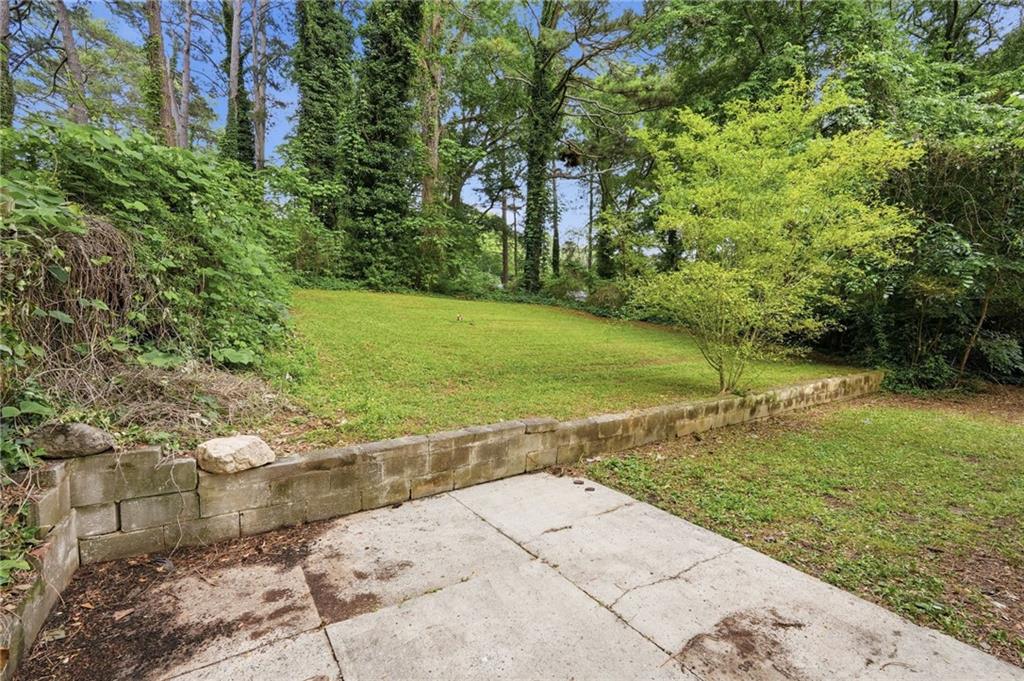 1222 Elizabeth Avenue Southwest Atlanta, GA 30310 - Photo 37 of 46 a view of a yard with an trees