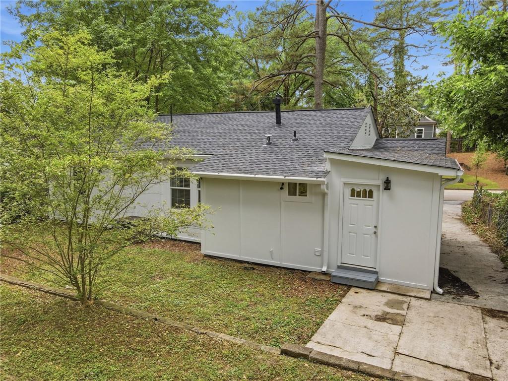 1222 Elizabeth Avenue Southwest Atlanta, GA 30310 - Photo 38 of 46 a front view of a house with a yard