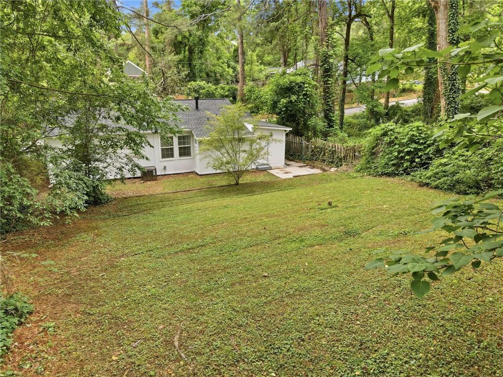 1222 Elizabeth Avenue Southwest Atlanta, GA 30310 - Photo 41 of 46 a view of a large yard with a large tree