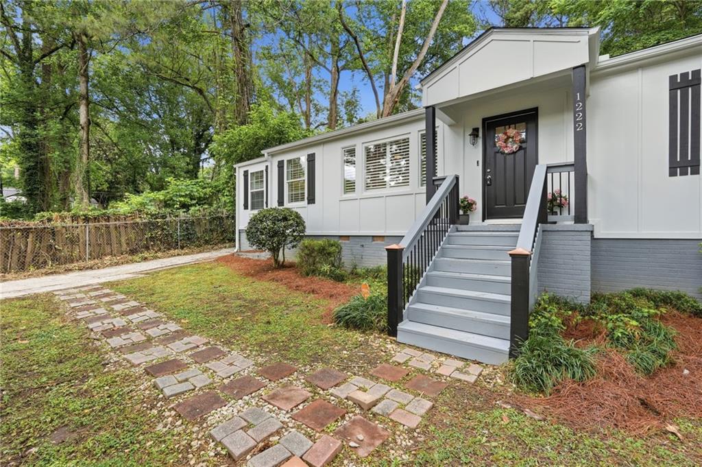 1222 Elizabeth Avenue Southwest Atlanta, GA 30310 - Photo 7 of 46 a view of a house with backyard and trees