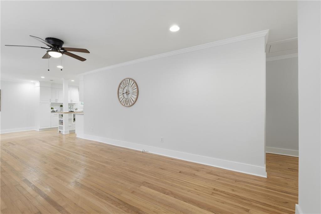 1222 Elizabeth Avenue Southwest Atlanta, GA 30310 - Photo 10 of 46 a view of a room with wooden floor and white walls