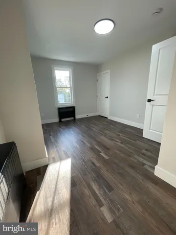 a bathroom with a sink a toilet and a shower