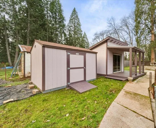 a view of a front of a house with a yard