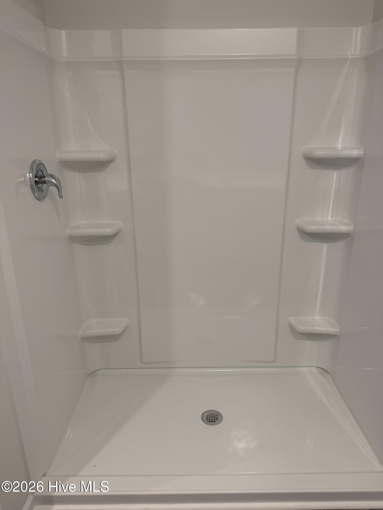 413 Ladyfish Loop Northwest Sunset Beach, NC 28468 - Photo 11 of 26 Primary Bath - Walk In Shower