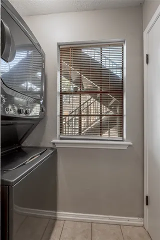 a kitchen with a stove and a microwave