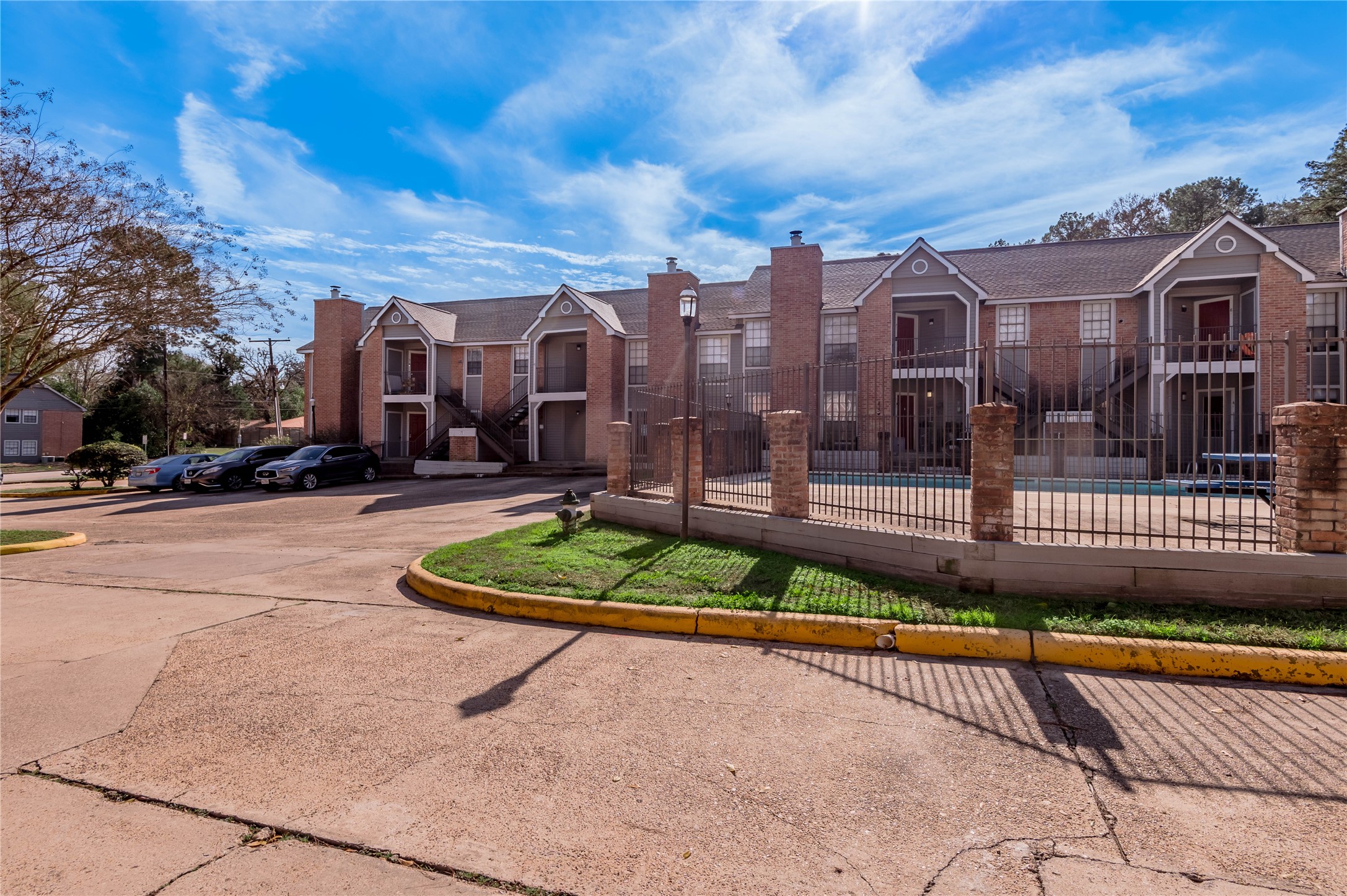 2402 Sycamore Avenue, Unit E2 Huntsville, TX 77340 - Photo 27 of 43 a view of a city with tall buildings