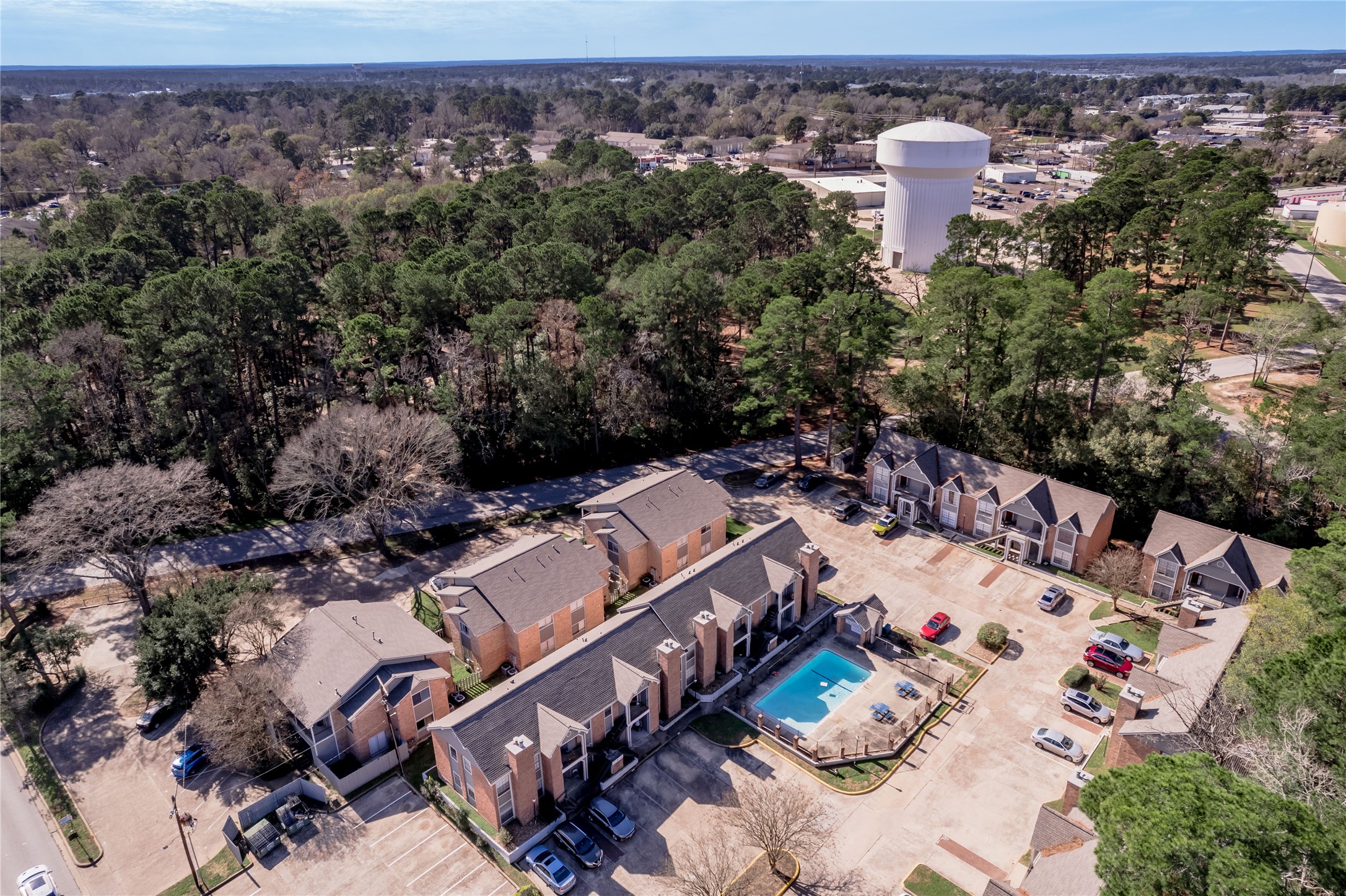 2402 Sycamore Avenue, Unit E2 Huntsville, TX 77340 - Photo 33 of 43 an aerial view of a house with a yard