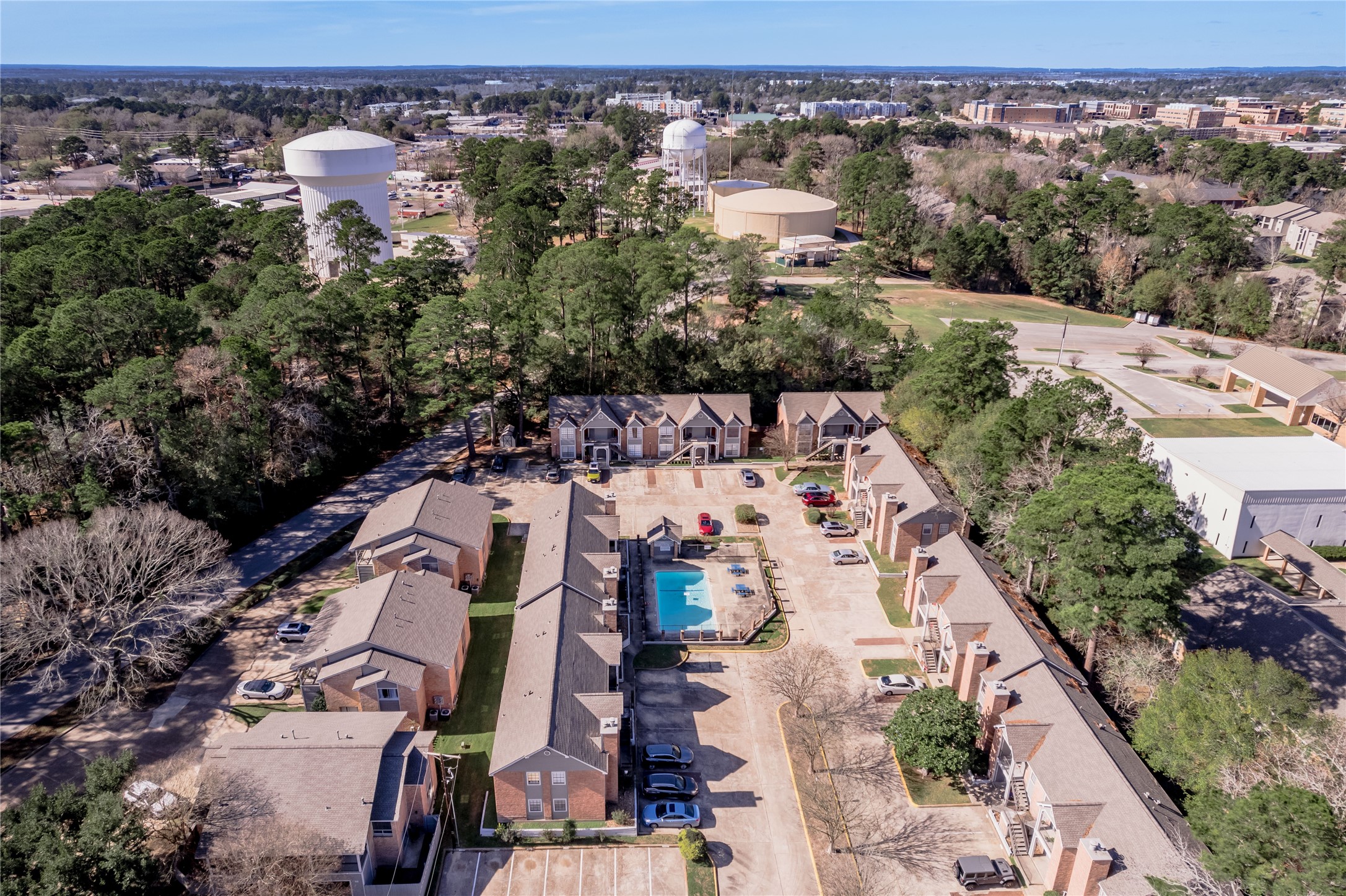 2402 Sycamore Avenue, Unit E2 Huntsville, TX 77340 - Photo 34 of 43 an aerial view of multiple house