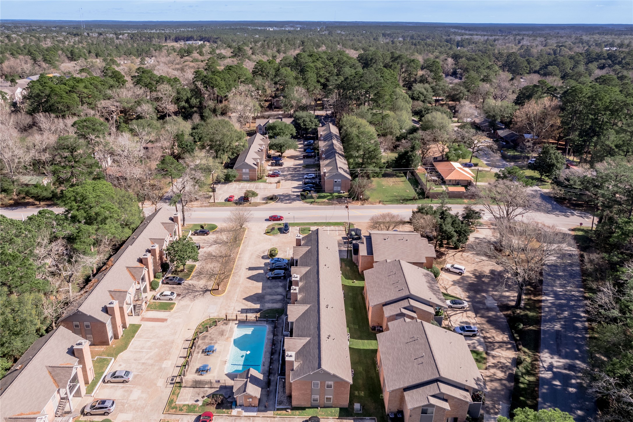 2402 Sycamore Avenue, Unit E2 Huntsville, TX 77340 - Photo 38 of 43 an aerial view of multiple house