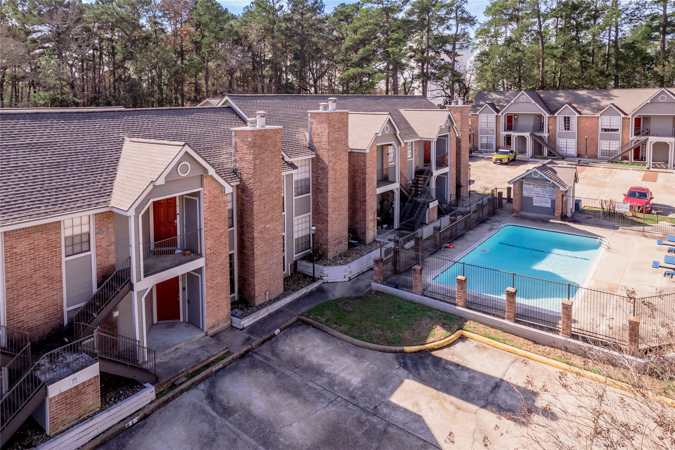 2402 Sycamore Avenue, Unit E2 Huntsville, TX 77340 - Photo 4 of 43 a view of a house with backyard stove and sitting area