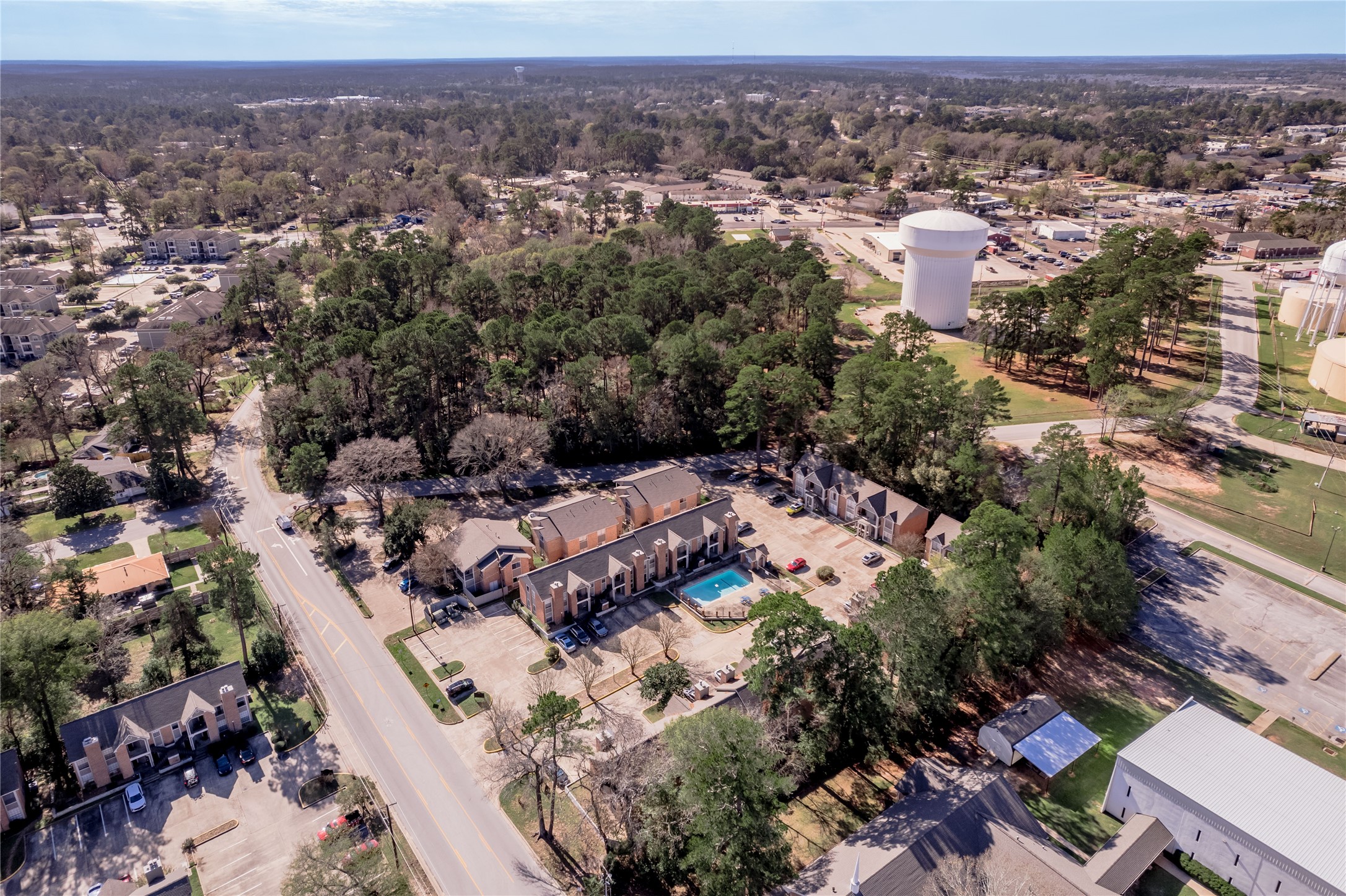 2402 Sycamore Avenue, Unit E2 Huntsville, TX 77340 - Photo 41 of 43 an aerial view of multiple house