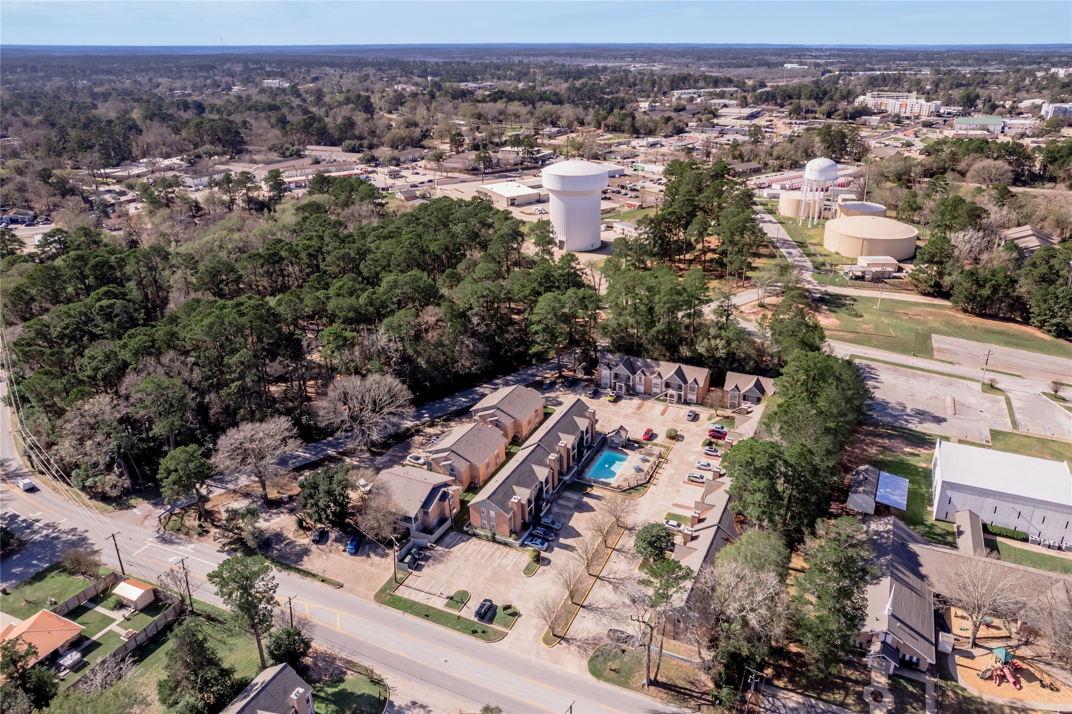 2402 Sycamore Avenue, Unit E2 Huntsville, TX 77340 - Photo 42 of 43 an aerial view of multiple house