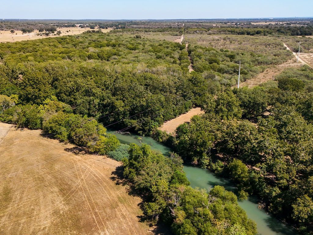 5400 Gander Slough Road Kingsbury, TX 78638 - Photo 20 of 40 a view of a field with an ocean