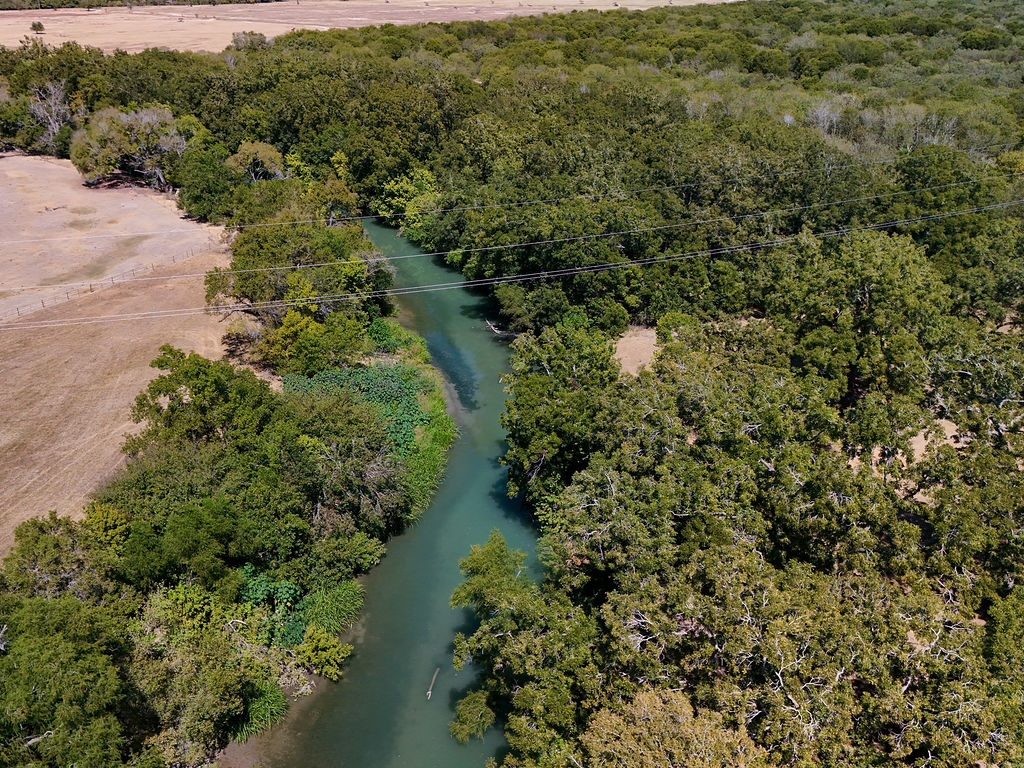 5400 Gander Slough Road Kingsbury, TX 78638 - Photo 2 of 40 Aerial view - partial area of the river frontage by one of the hay fields