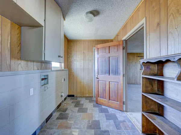 a view of a livingroom with a flat screen tv