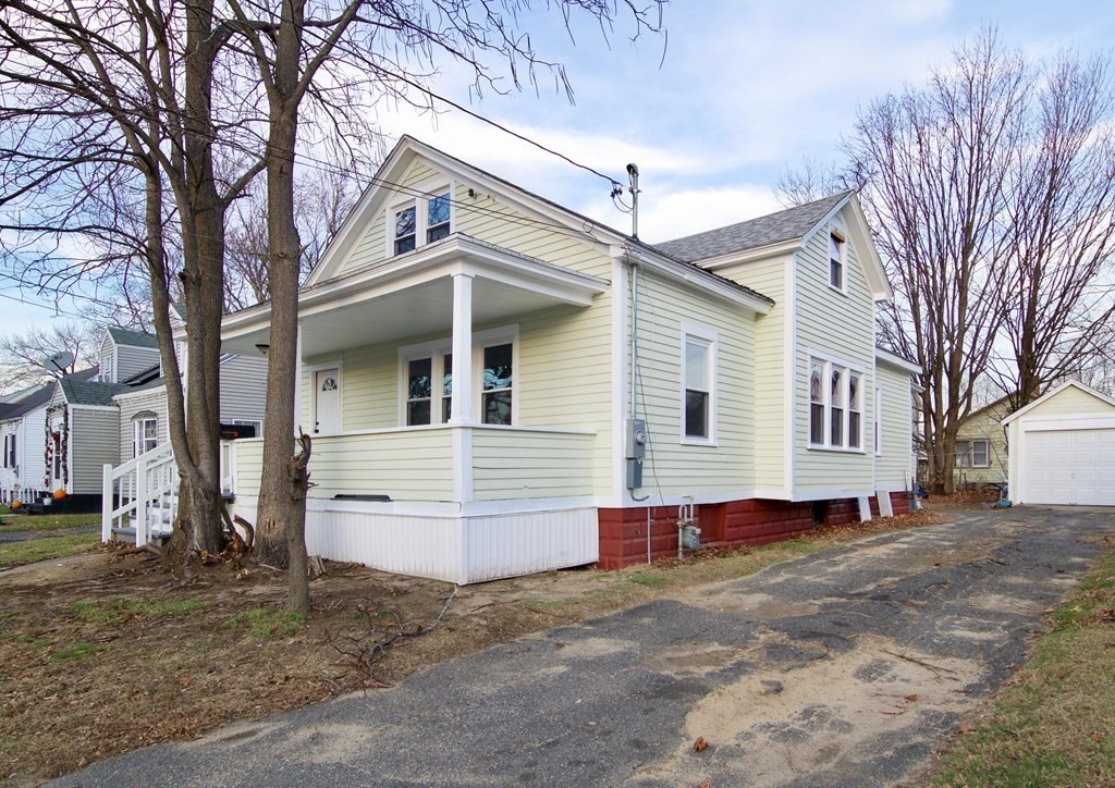 81 Haskin Street Springfield, MA 01109 - Photo 1 of 39 a view of a house with a yard