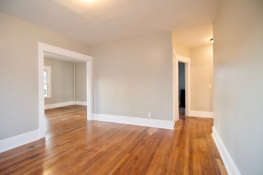 81 Haskin Street Springfield, MA 01109 - Photo 13 of 39 a view of a room with wooden floor