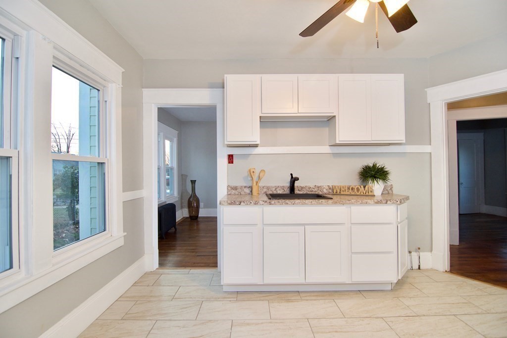 81 Haskin Street Springfield, MA 01109 - Photo 18 of 39 a kitchen with a sink and cabinets