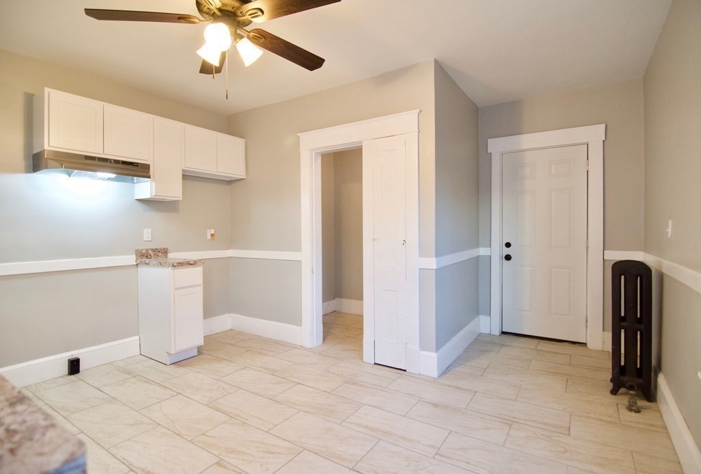 81 Haskin Street Springfield, MA 01109 - Photo 21 of 39 a view of a kitchen with a sink and dishwasher in kitchen