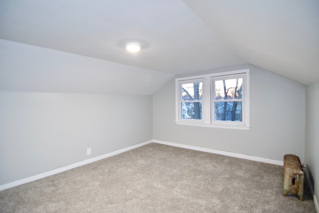 81 Haskin Street Springfield, MA 01109 - Photo 36 of 39 an empty room with windows
