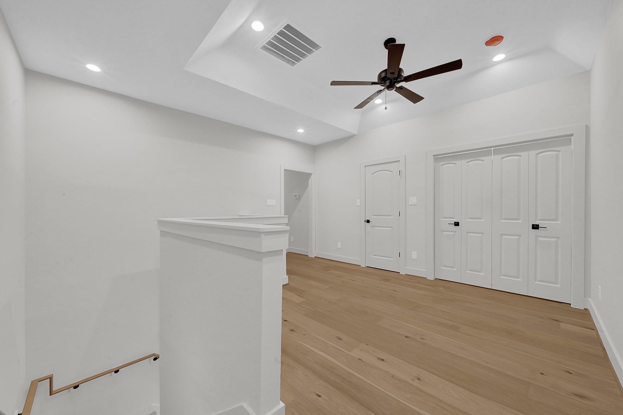 3630 Lydia Street Houston, TX 77021 - Photo 14 of 27 a view of empty room with wooden floor