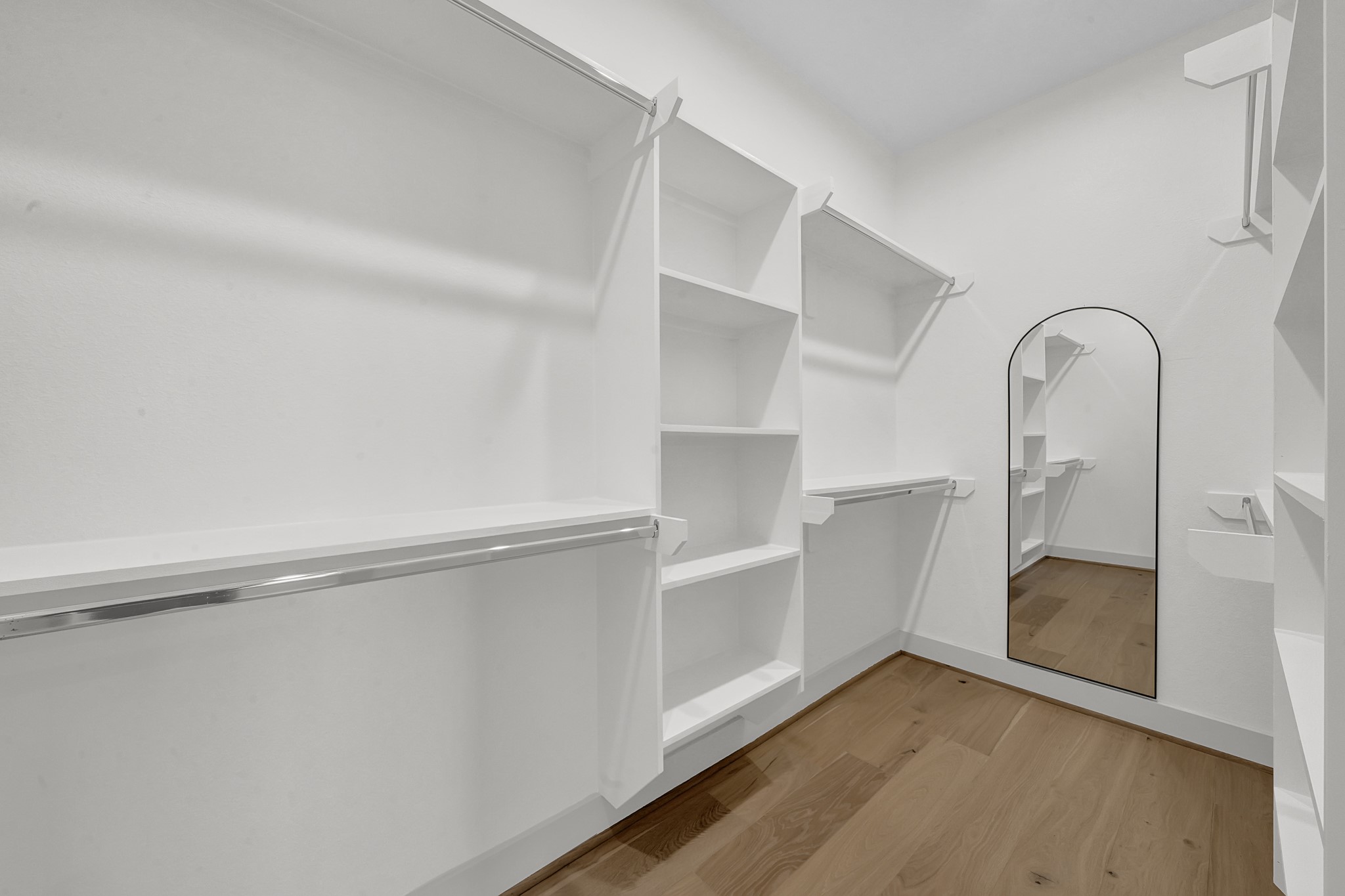 3630 Lydia Street Houston, TX 77021 - Photo 18 of 27 a view of an empty room with wooden floor and a window