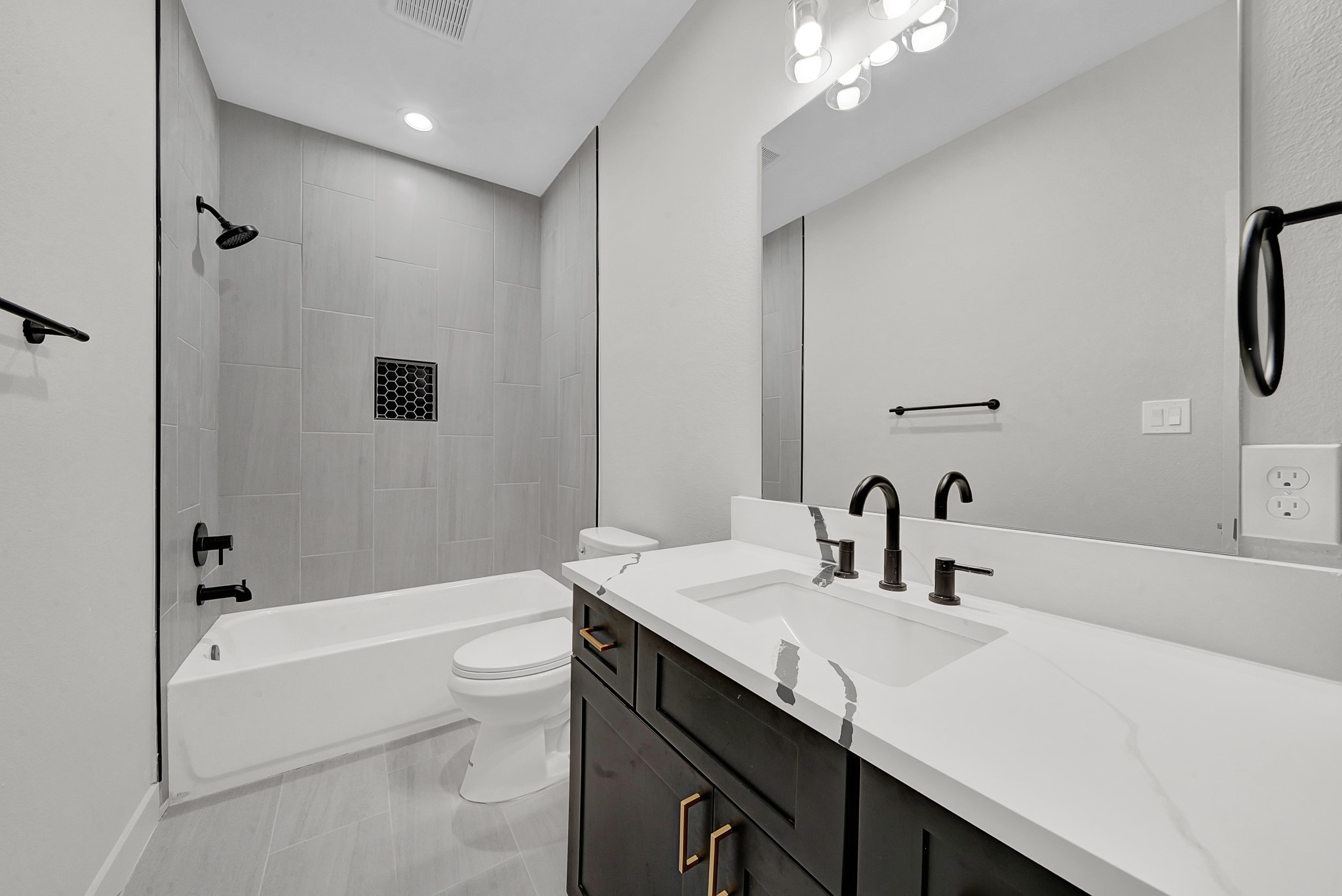 3630 Lydia Street Houston, TX 77021 - Photo 22 of 27 a bathroom with a sink a toilet and shower