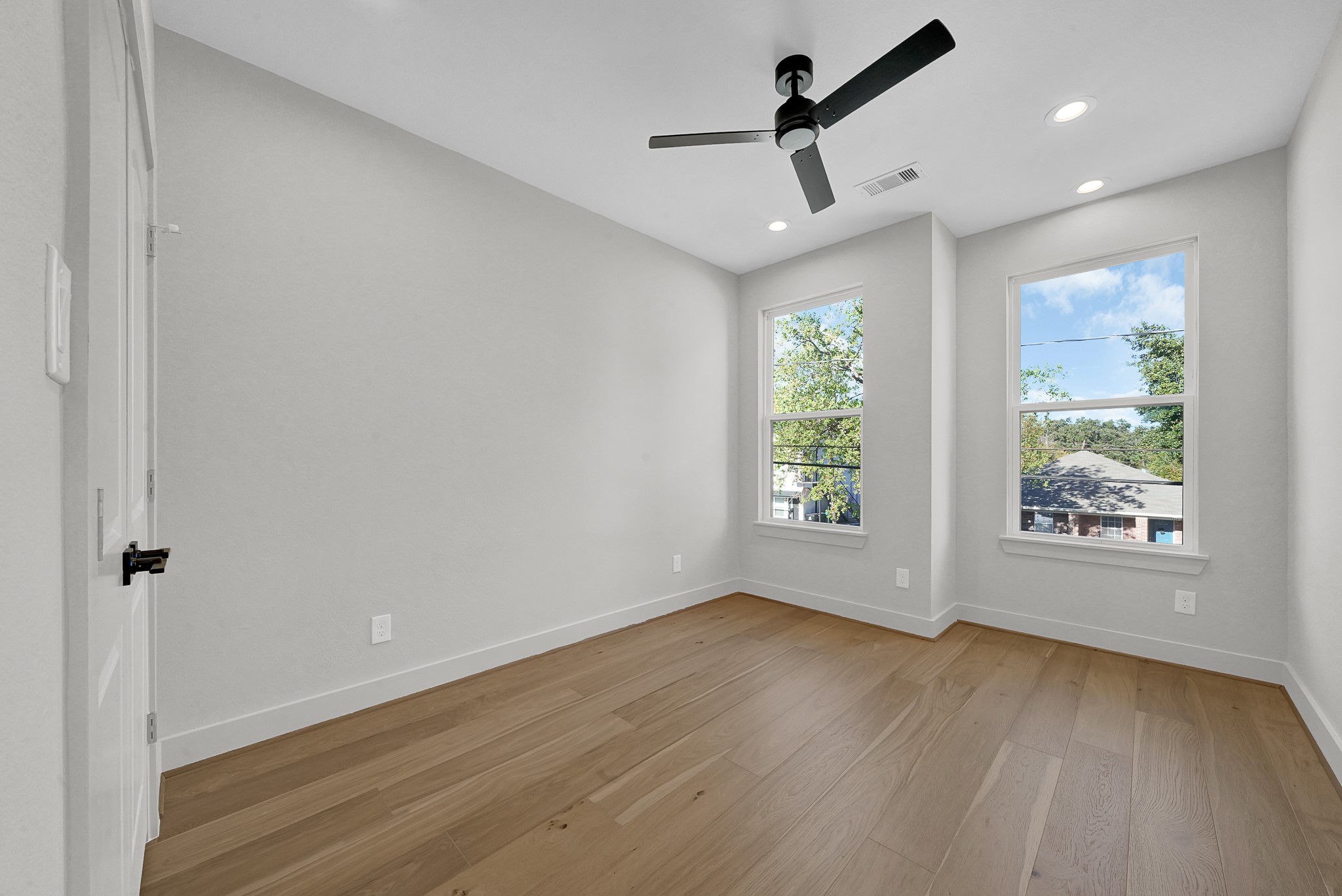 3630 Lydia Street Houston, TX 77021 - Photo 23 of 27 wooden floor in an empty room with a window