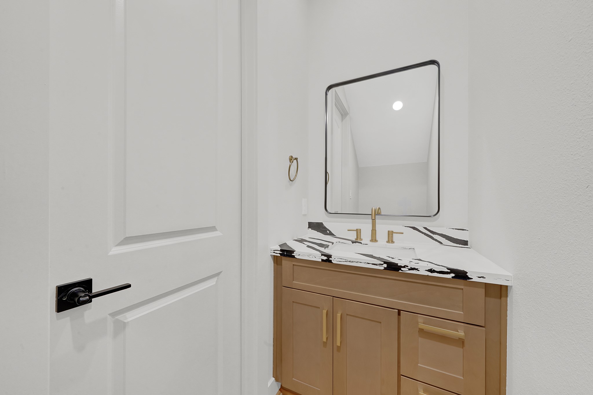 3630 Lydia Street Houston, TX 77021 - Photo 7 of 27 a bathroom with a sink and a mirror