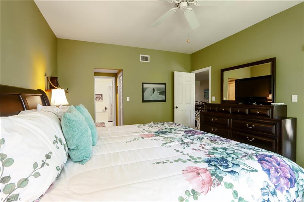 5895 Chanteclair Drive, Unit 114 Naples, FL 34108 - Photo 11 of 21 Bedroom featuring ceiling fan