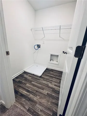 a view of a utility room with a sink