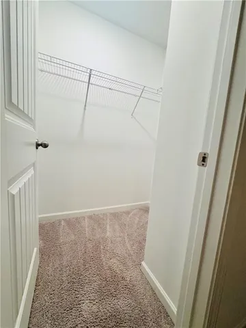 a view of a room with an empty space