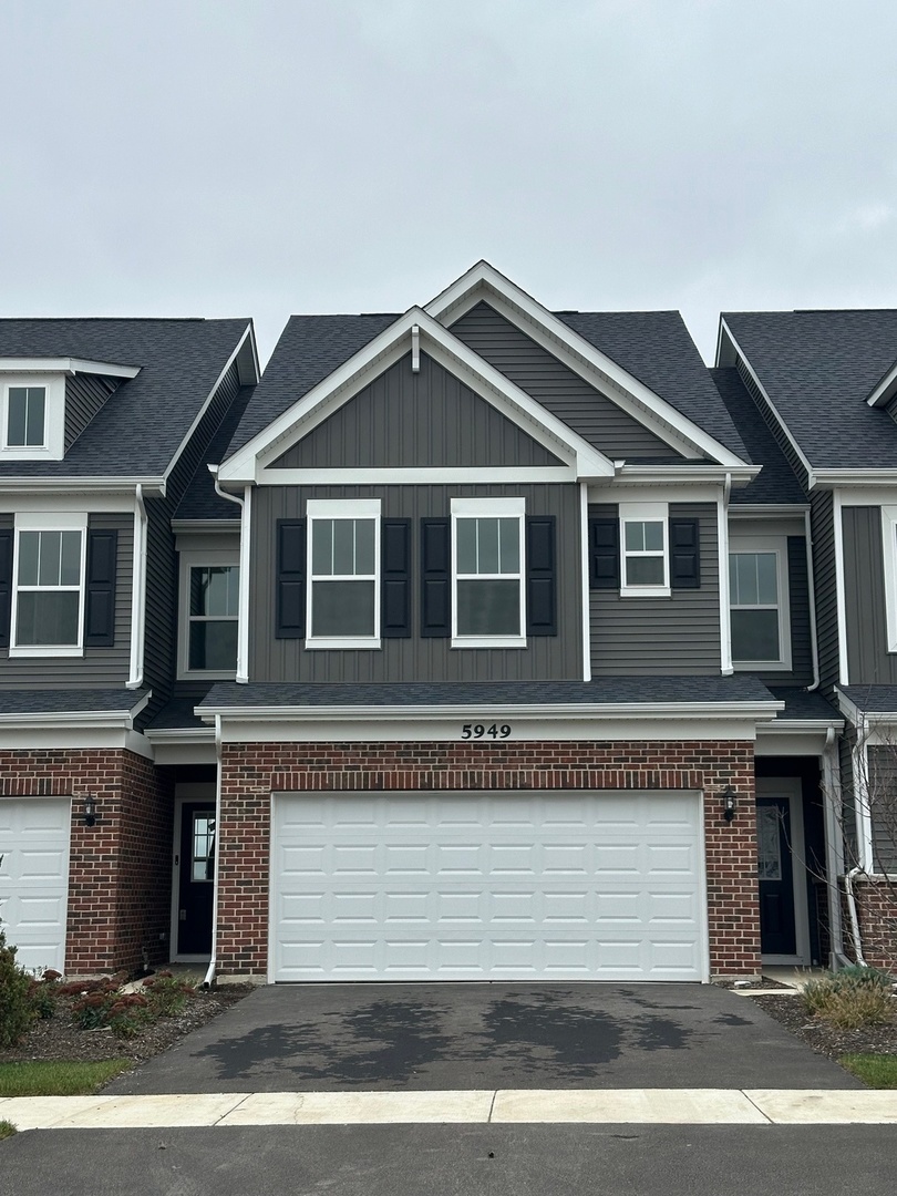 5949 Hawkweed Drive Plainfield, IL 60585 - Photo 2 of 25 a front view of a house