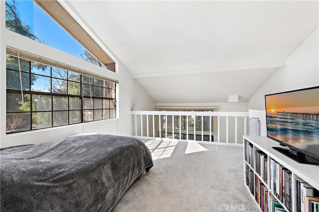 165 Pineview Irvine, CA 92620 - Photo 13 of 23 a bedroom with a bed and a large window