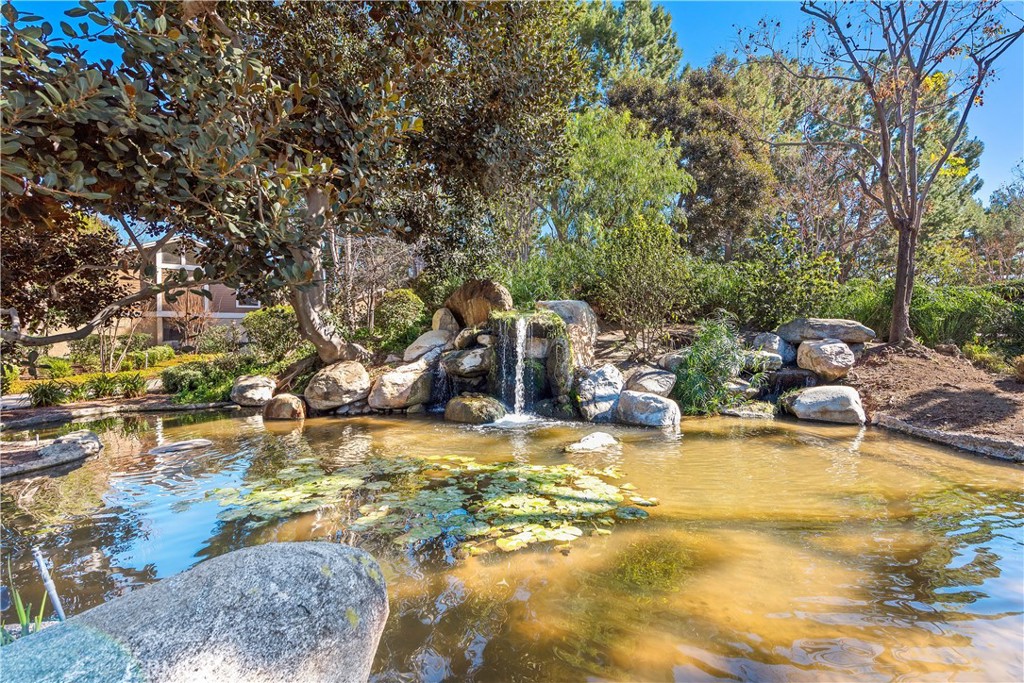 165 Pineview Irvine, CA 92620 - Photo 18 of 23 a view of a swimming pool with a patio and a yard