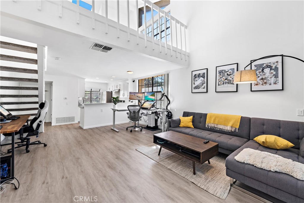 165 Pineview Irvine, CA 92620 - Photo 2 of 23 a living room with furniture and wooden floor